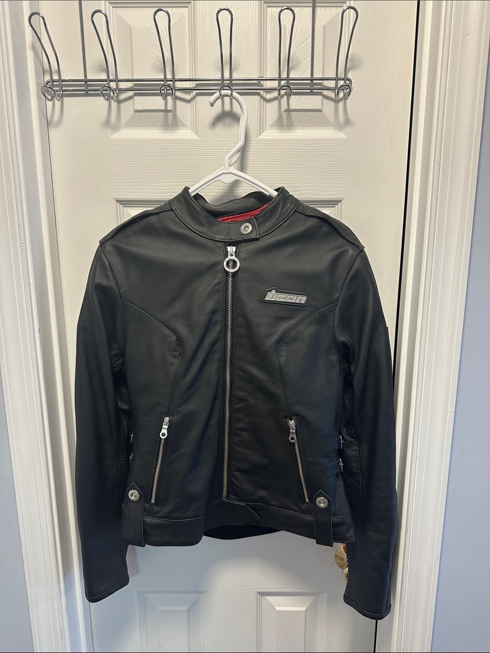 ICON Hella Black Leather Moto Jacket with Ring Zip Pull